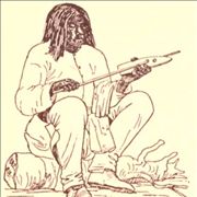 Picture Of A Shoshone Man Using An Arrow Shaft Straightener