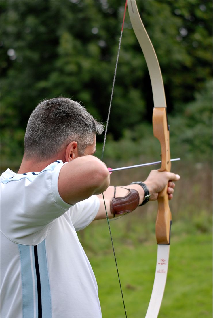 Picture Of Archer Aiming At Target